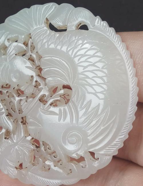 双鱼玉佩到底是什么？双鱼玉佩到底是什么 毒蕉？  第3张
