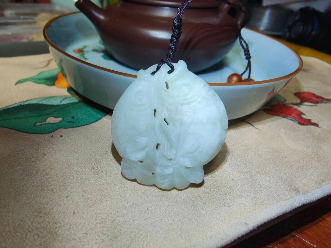 双鱼玉佩到底是什么？双鱼玉佩到底是什么 毒蕉？  第4张